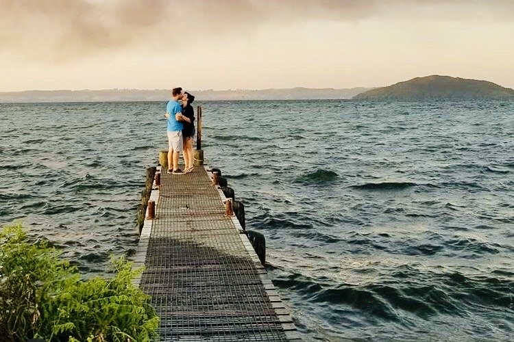 Couple kissing in New Zealand